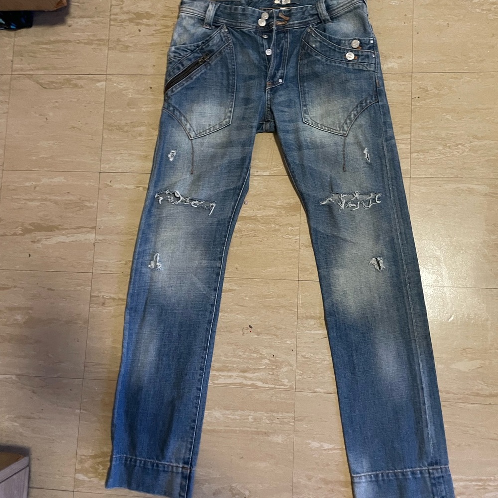 Vintage Reworked denim jeans.